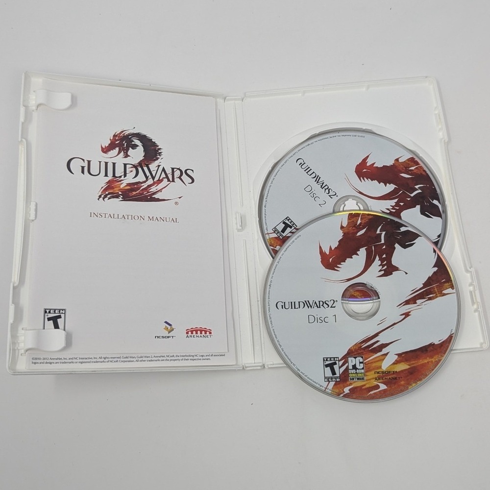 Guild Wars 2 PC Game DVD-ROM ArenaNet 2-Disc Set with Manual and Serial Code - Picture 2 of 11